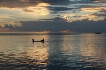 Paddleboarding at sunset, Bora Bora 
Photo Credit: Kit Schultze - Esplanade Travel